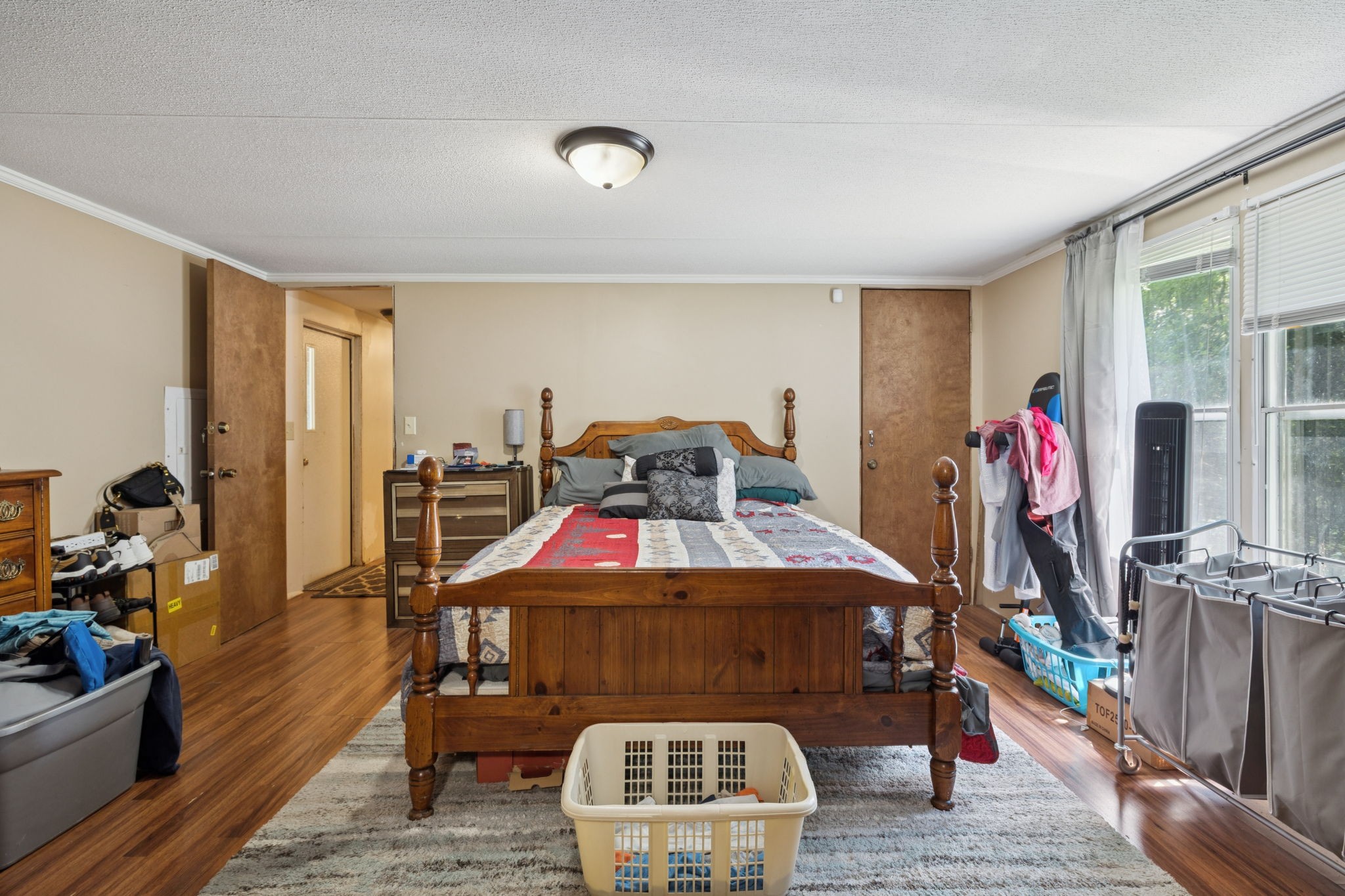 167 Green Hill Road Pleasant Shade, TN 37145 - Photo 22 of 43 a bed room with a bed and a couch