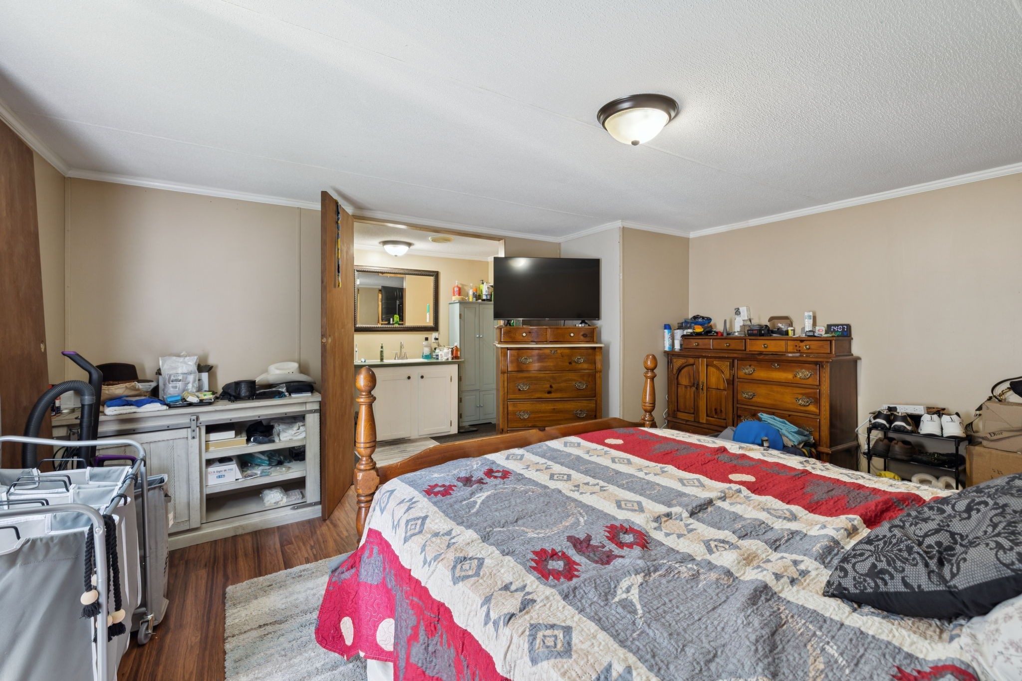 167 Green Hill Road Pleasant Shade, TN 37145 - Photo 23 of 43 a bed room with a bed and a television