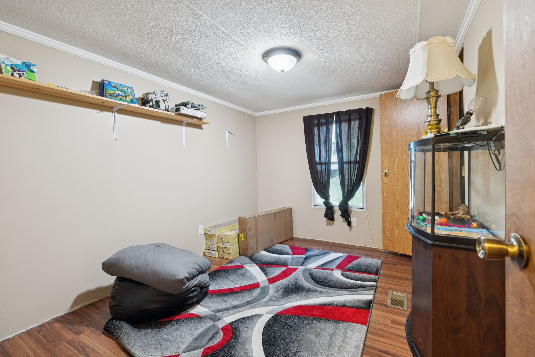 167 Green Hill Road Pleasant Shade, TN 37145 - Photo 26 of 43 a bedroom with furniture and a window