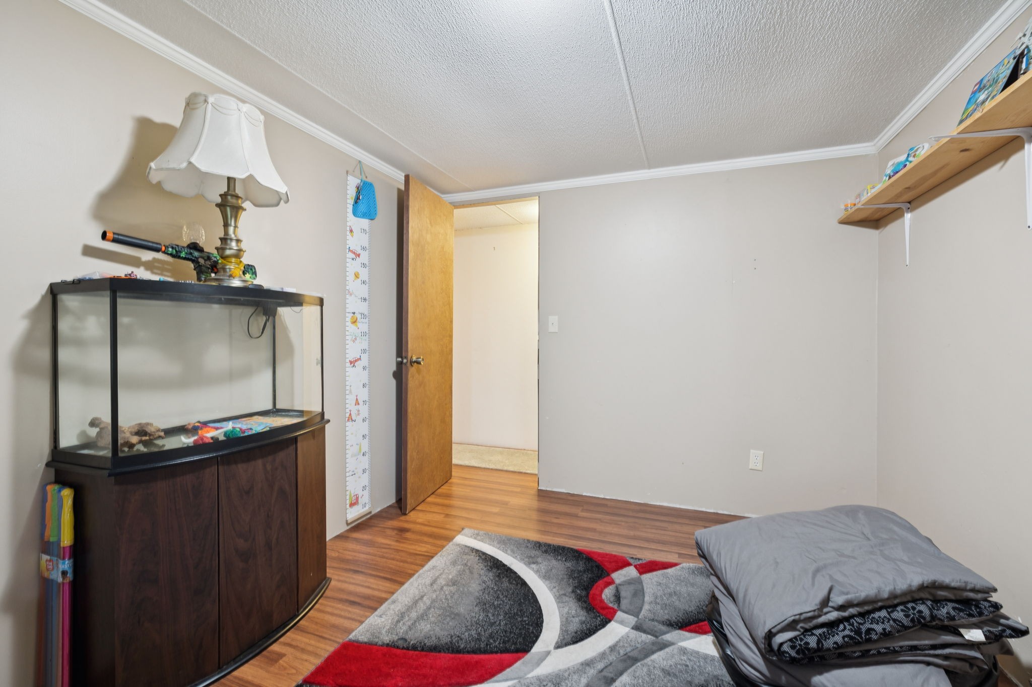 167 Green Hill Road Pleasant Shade, TN 37145 - Photo 27 of 43 a bedroom with a bed and a mirror