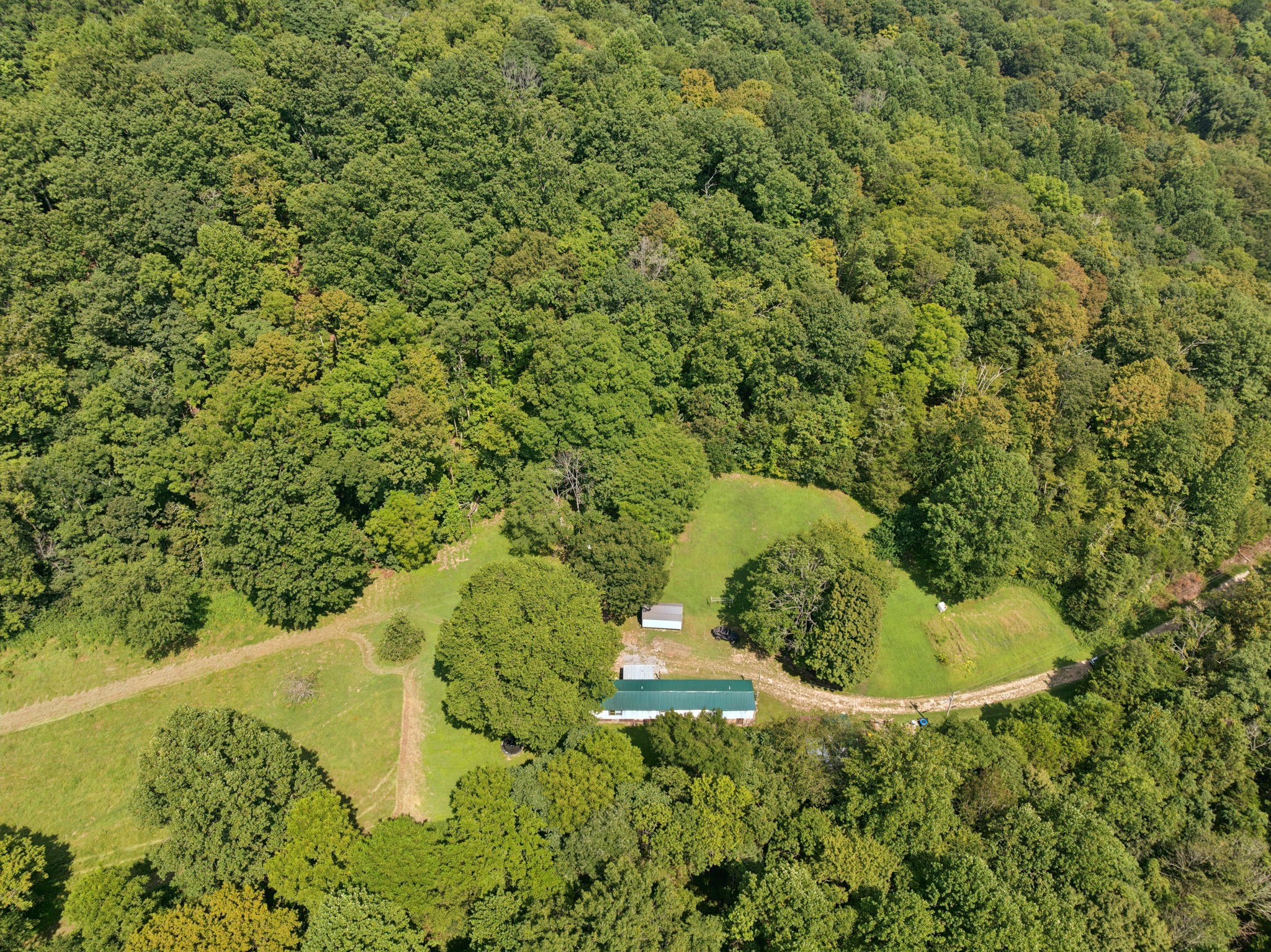 167 Green Hill Road Pleasant Shade, TN 37145 - Photo 38 of 43 a bathroom with a sink and mirror