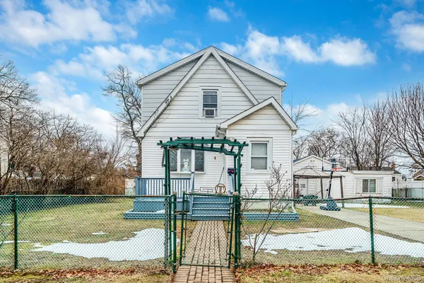 front view of house with a yard