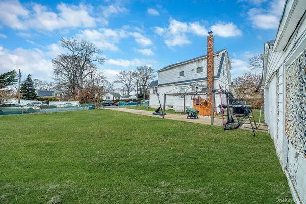 a view of a garden with a house