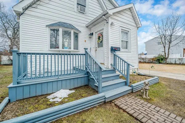 a view of a wooden deck with a bench
