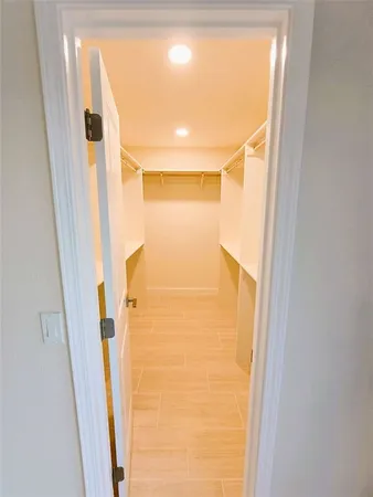 a bathroom with a shower and a tub