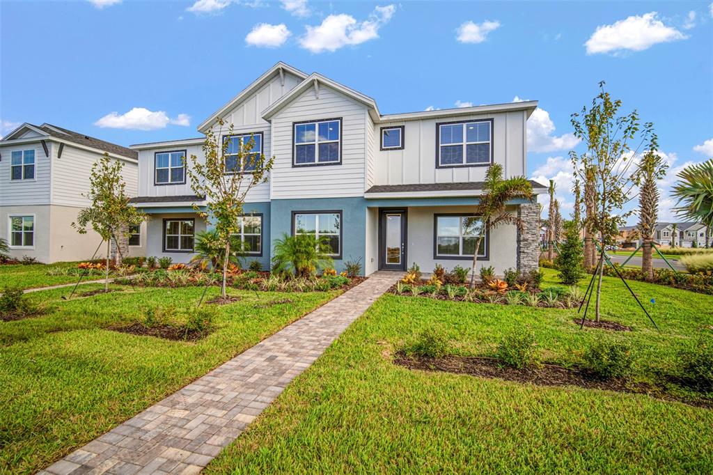 10705 Wading River Avenue Parrish, FL 34219 - Photo 1 of 28 a front view of a house with a yard