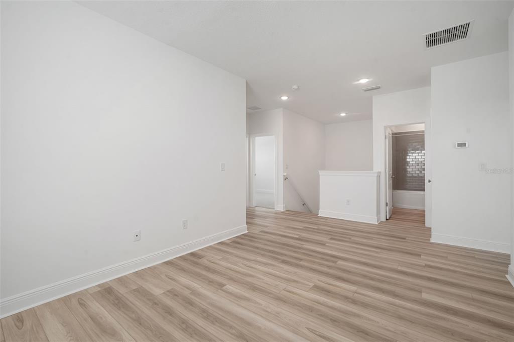 10705 Wading River Avenue Parrish, FL 34219 - Photo 16 of 28 a view of a livingroom with wooden floor