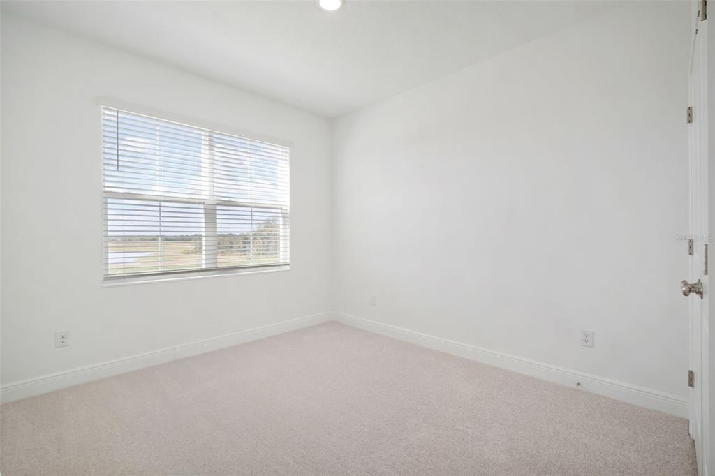 10705 Wading River Avenue Parrish, FL 34219 - Photo 18 of 28 an empty room with a window
