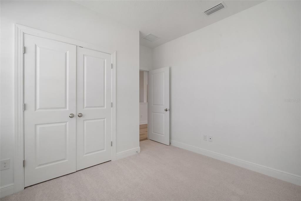 10705 Wading River Avenue Parrish, FL 34219 - Photo 23 of 28 a view of an empty room