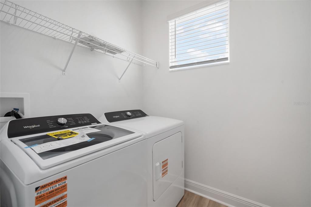 10705 Wading River Avenue Parrish, FL 34219 - Photo 26 of 28 a utility room with dryer and washer