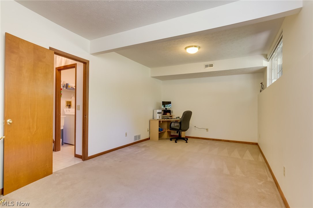 8433 Hendricks Road Mentor, OH 44060 - Photo 24 of 31 This large family room gives you an additional living space or two. Great for man cave or where kids can play.