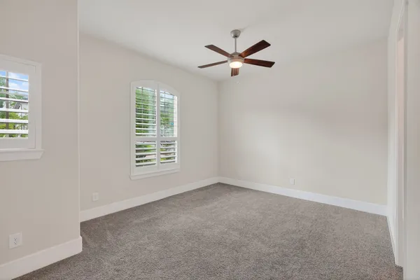 wooden floor with furniture and a potted plant