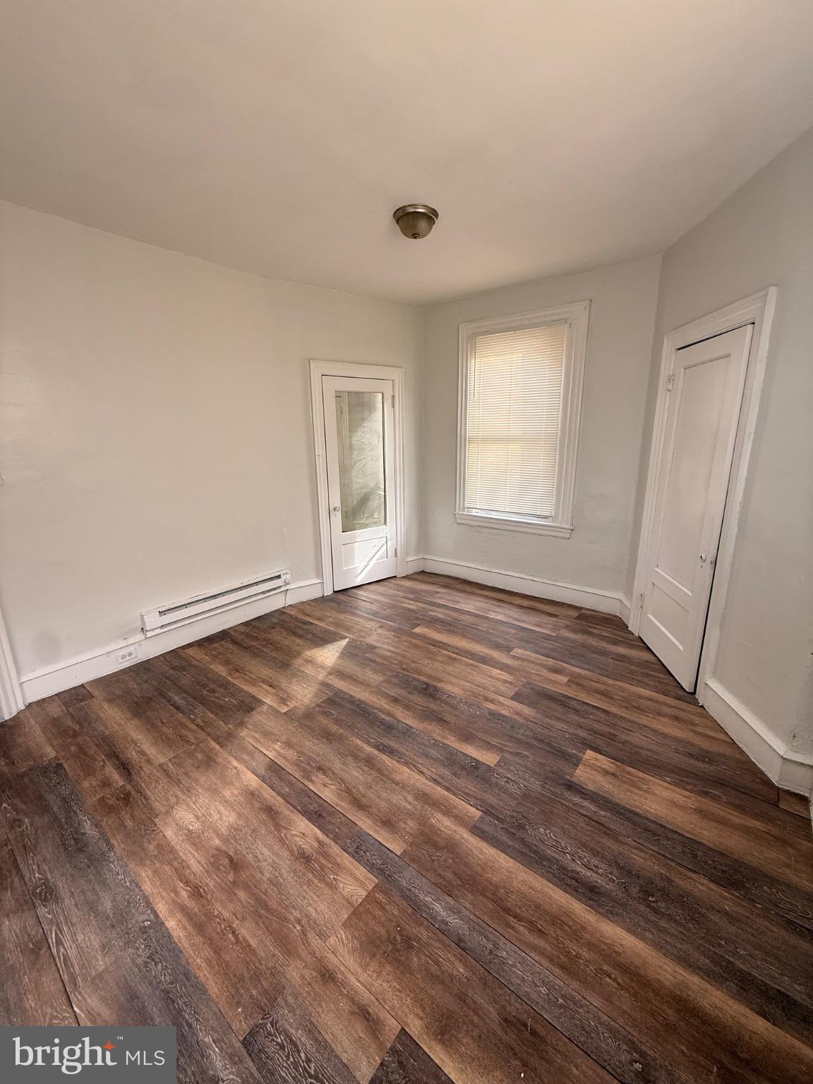 4759 North Camac Street Philadelphia, PA 19141 - Photo 10 of 11 a view of empty room with wooden floor and fan