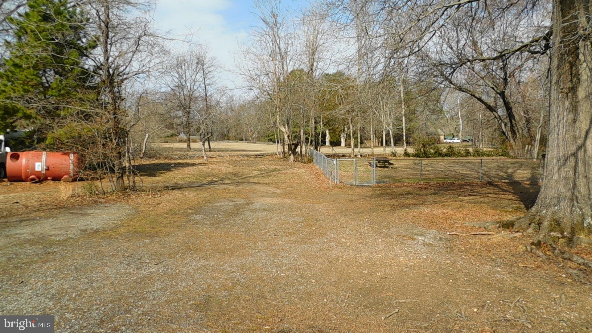 10374 Rectory Lane King George, VA 22485 - Photo 19 of 25 Back Yard with Fenced Dog Pen