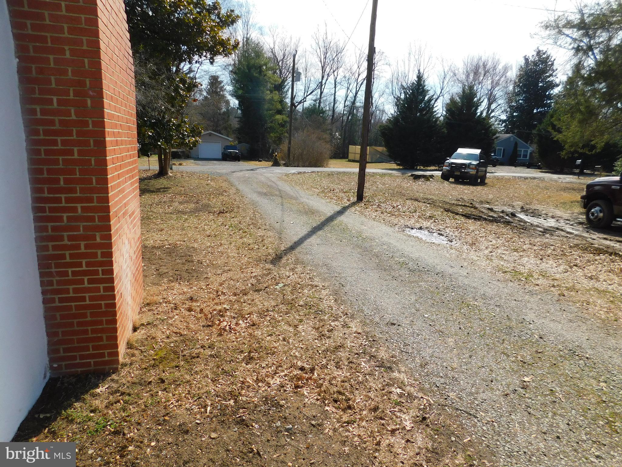 10374 Rectory Lane King George, VA 22485 - Photo 21 of 25 Side Yard and Driveway