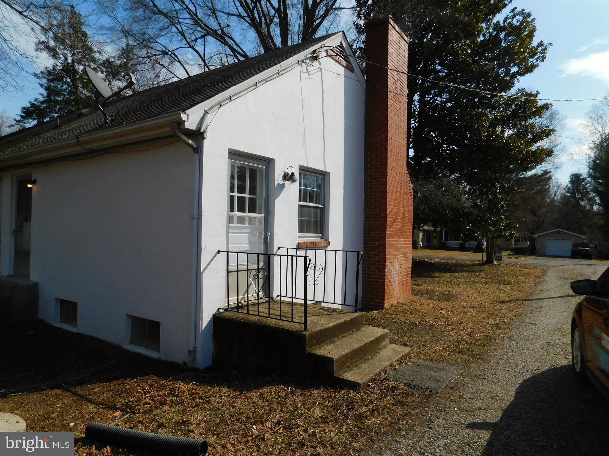 10374 Rectory Lane King George, VA 22485 - Photo 22 of 25 Side Door and Driveway