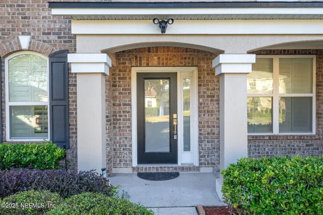 a front view of a house with a porch