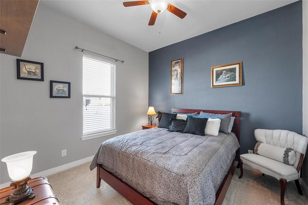 1420 Hoosier Park Robinson, TX 76706 - Photo 20 of 40 Carpeted bedroom with ceiling fan