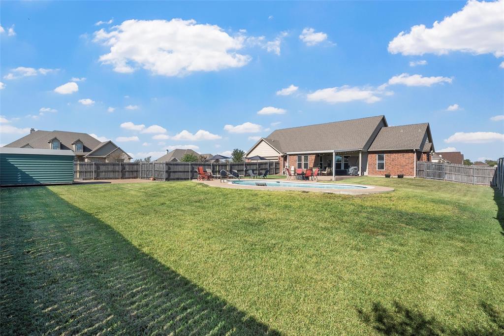 1420 Hoosier Park Robinson, TX 76706 - Photo 34 of 40 Fenced backyard with a patio and a residential view