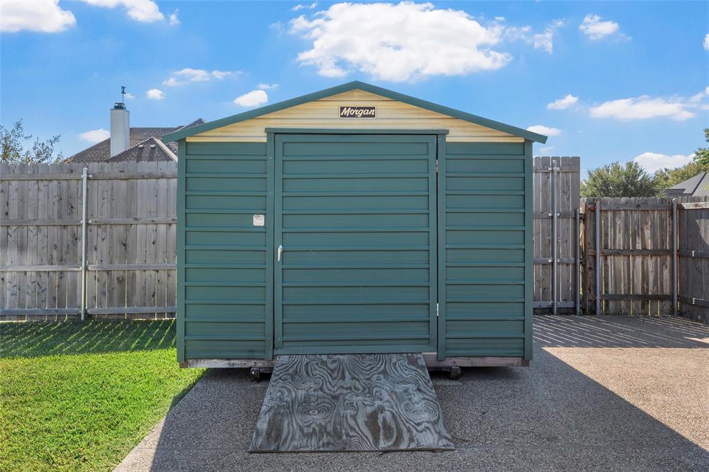 1420 Hoosier Park Robinson, TX 76706 - Photo 35 of 40 View of shed with a fenced backyard