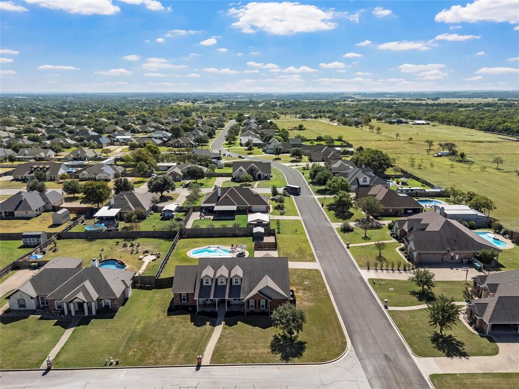 1420 Hoosier Park Robinson, TX 76706 - Photo 36 of 40 Aerial view of residential area featuring an in-ground pool and showing the corner lot