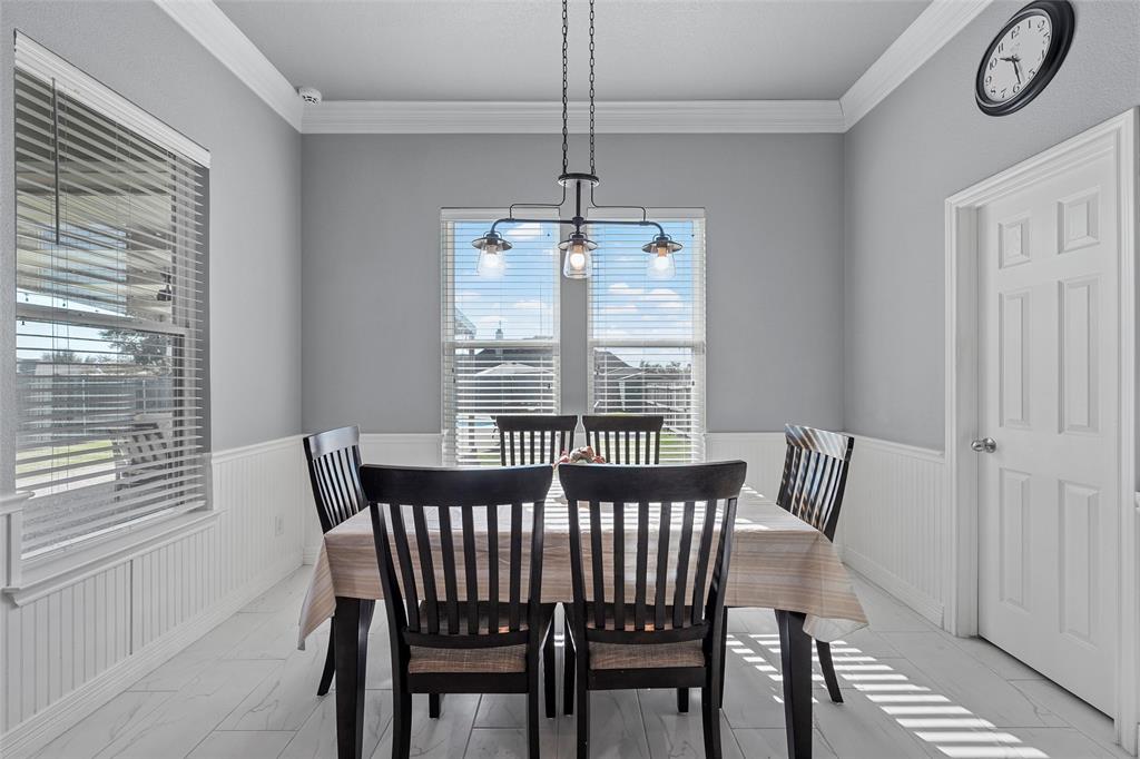 1420 Hoosier Park Robinson, TX 76706 - Photo 6 of 40 Dining area with ornamental molding and wainscoting