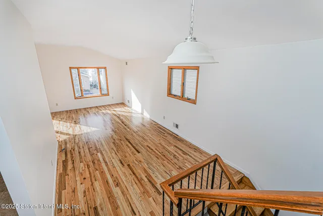 a view of backyard with a ceiling fan