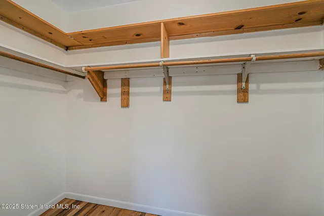 a view of a room with racks on the wall