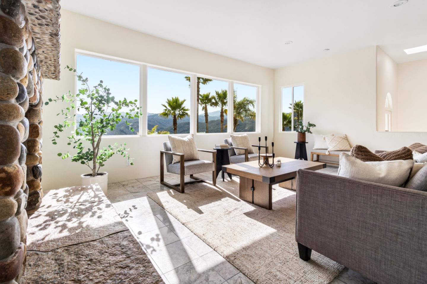 320 El Caminito Road Carmel Valley, CA 93924 - Photo 13 of 62 a living room with furniture and a large window