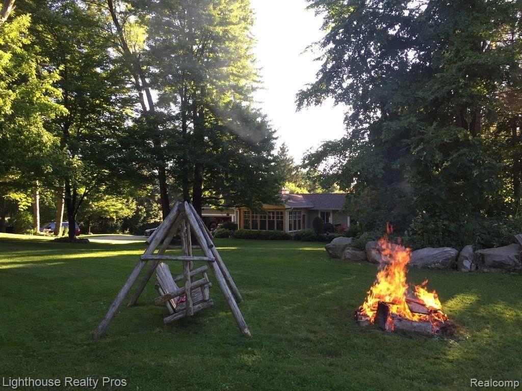 7150 Denton Hill Road Fenton, MI 48430 - Photo 47 of 47 Backyard totally secluded to enjoy bonfires or whatever you wish!