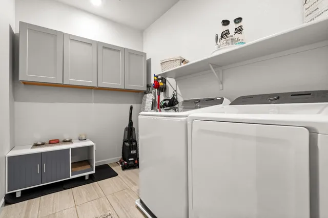 a bedroom with a bed and a table