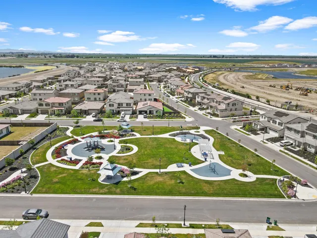aerial view of a house with a garden