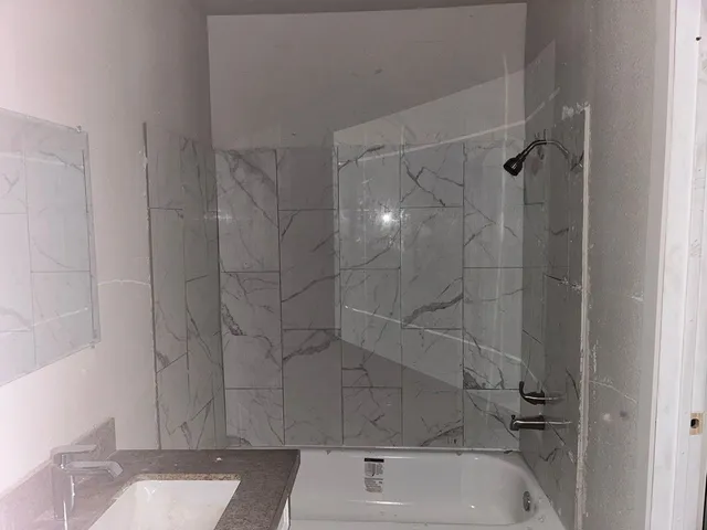 a bathroom with a bathtub