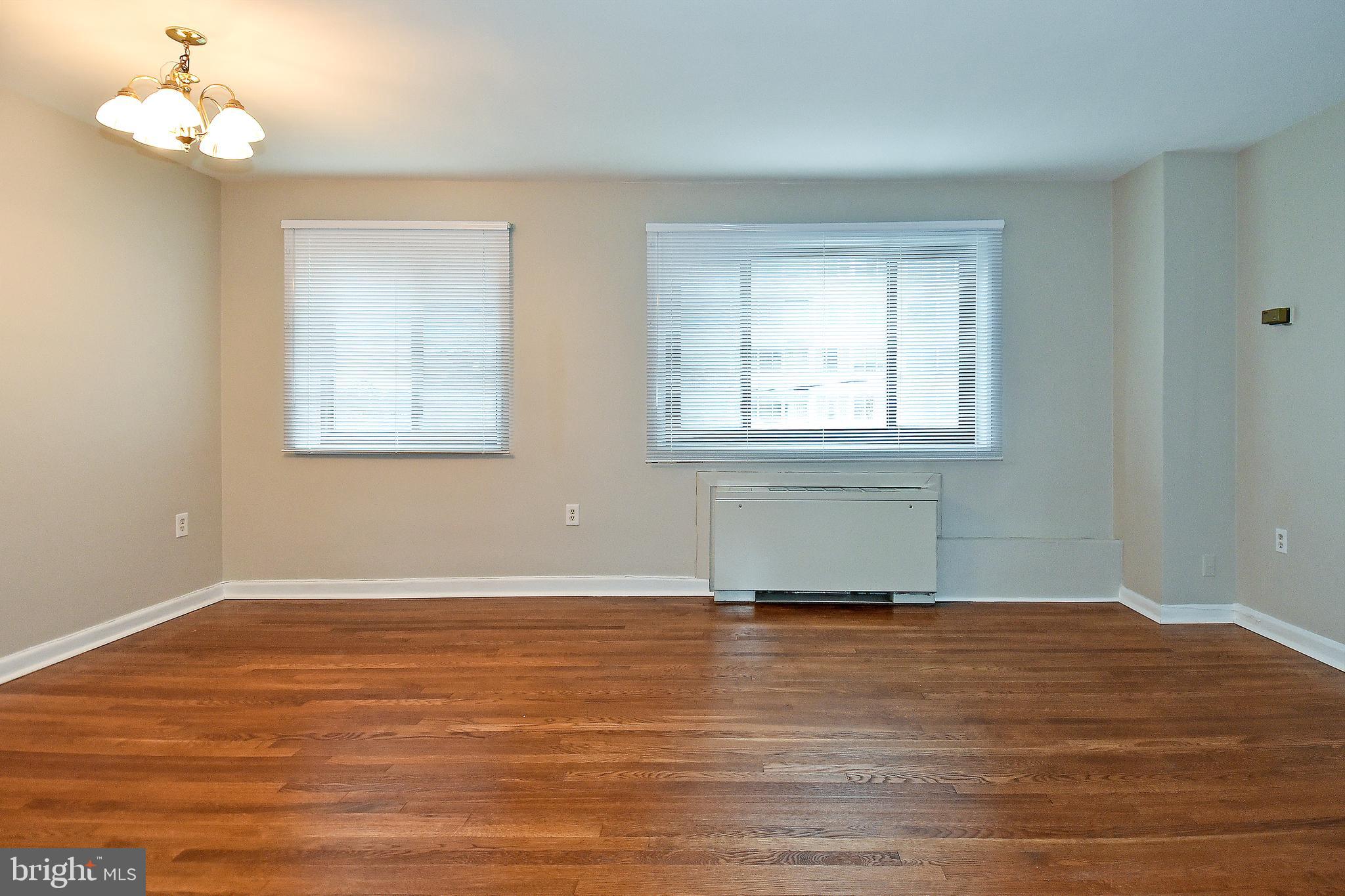 1200 South Arlington Ridge Road, Unit 512 Arlington, VA 22202 - Photo 11 of 30 Living Room and Dining Room