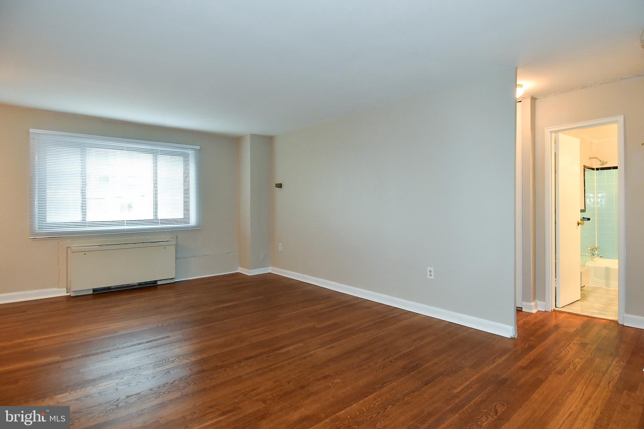 1200 South Arlington Ridge Road, Unit 512 Arlington, VA 22202 - Photo 8 of 30 Living Room to Hall Bath