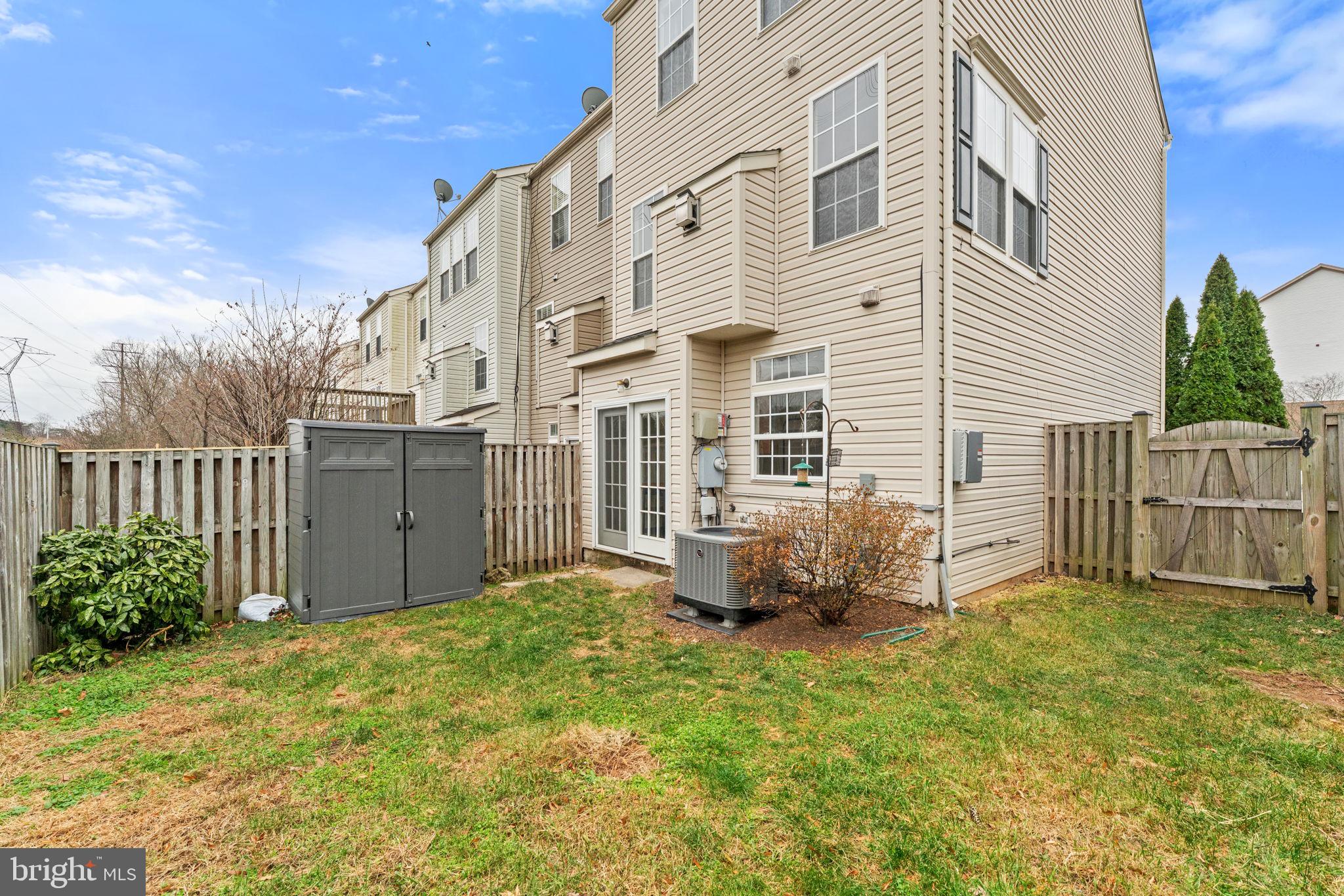 6741 Stone Maple Terrace Centreville, VA 20121 - Photo 22 of 24 a view of a house with backyard and garden