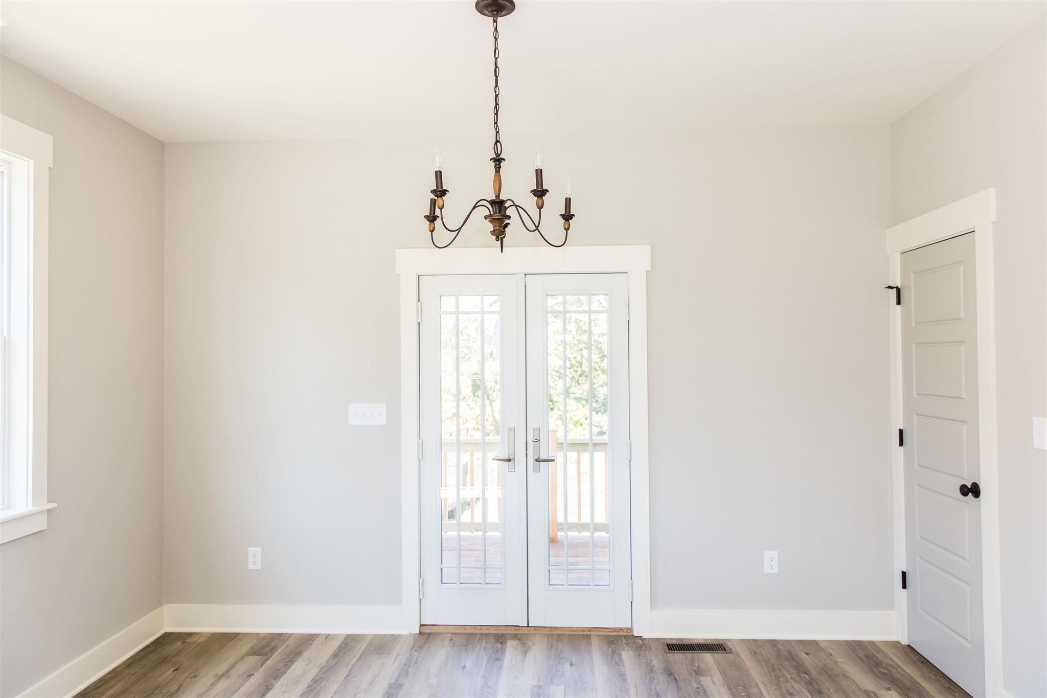 117 Spottswood Road Raphine, VA 24472 - Photo 15 of 52 a view of a room with wooden floor and windows