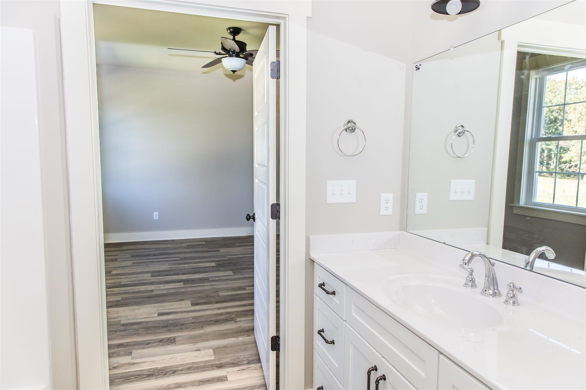 117 Spottswood Road Raphine, VA 24472 - Photo 35 of 52 a bathroom with a shower sink and mirror