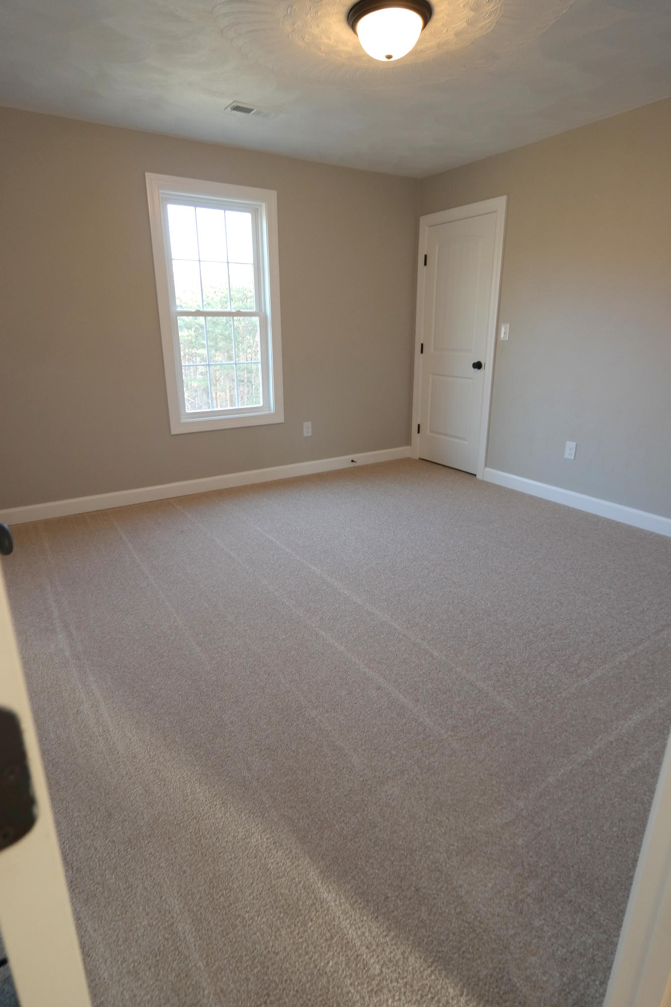 594 Thornblade Way Blue Ridge, VA 24064 - Photo 18 of 21 an empty room with a window