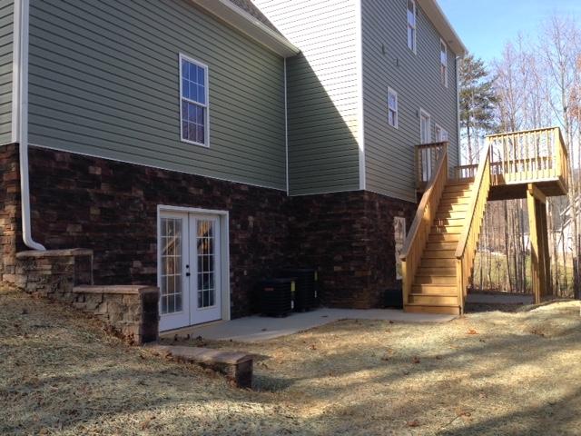 594 Thornblade Way Blue Ridge, VA 24064 - Photo 3 of 21 a view of a house with a patio