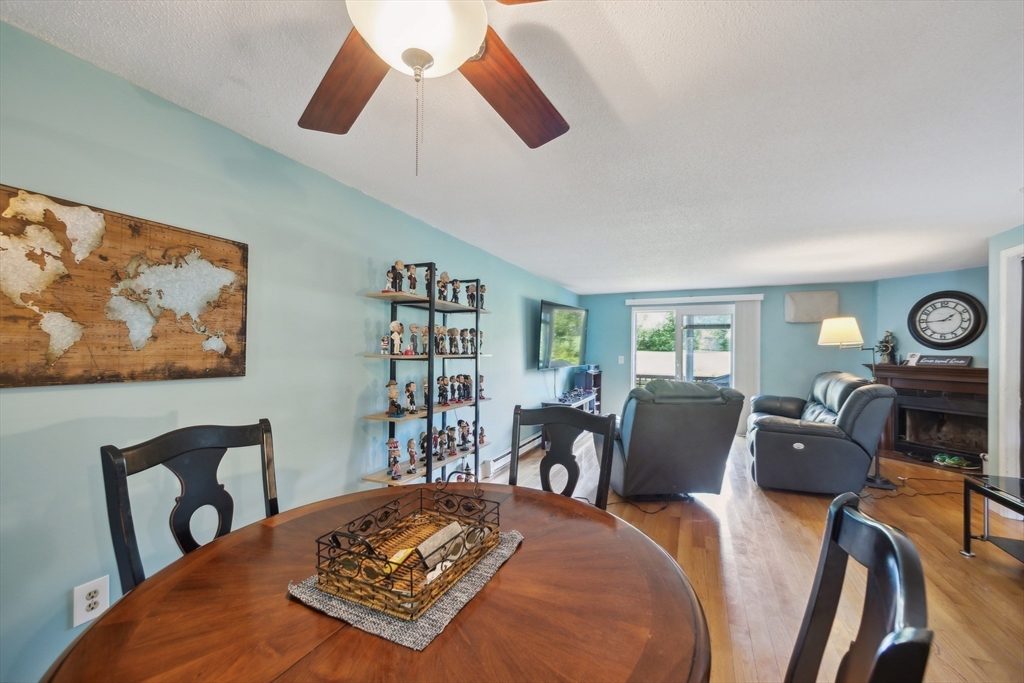 59 Seabury, Unit 59 Hampton, NH 03842 - Photo 8 of 25 a view of a dining room with furniture