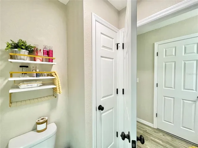 a bathroom with a sink and a shower curtain