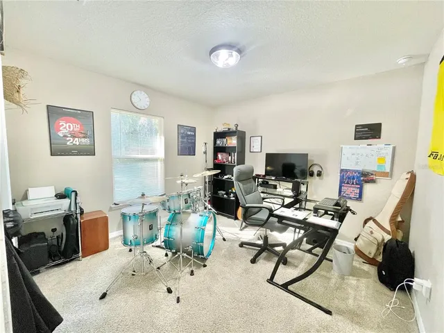 a view of a workspace with furniture