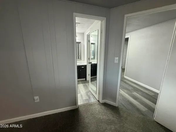 a view of entryway with wooden floor