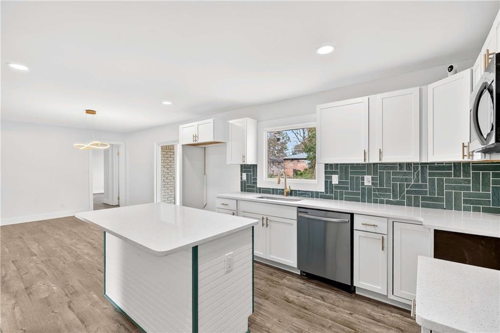 3292 Toney Drive Decatur, GA 30032 - Photo 12 of 28 a kitchen with white cabinets and white appliances