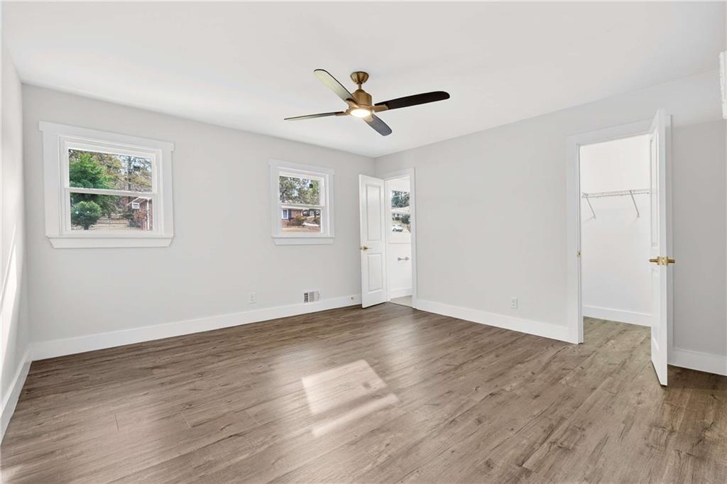 3292 Toney Drive Decatur, GA 30032 - Photo 18 of 28 a view of empty room with wooden floor and fan