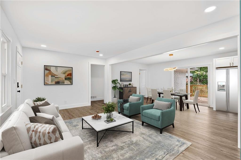 3292 Toney Drive Decatur, GA 30032 - Photo 4 of 28 a living room with furniture rug and wooden floor
