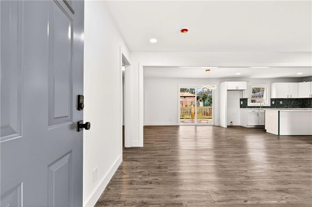 3292 Toney Drive Decatur, GA 30032 - Photo 7 of 28 a view of a kitchen with wooden floor and a window