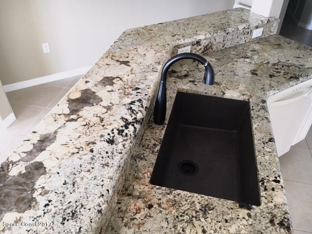 811 Del Rio Way, Unit 402 Merritt Island, FL 32953 - Photo 5 of 14 HUGE KITCHEN SINK