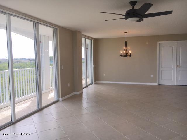 811 Del Rio Way, Unit 402 Merritt Island, FL 32953 - Photo 6 of 14 GREAT ROOM TO DINING